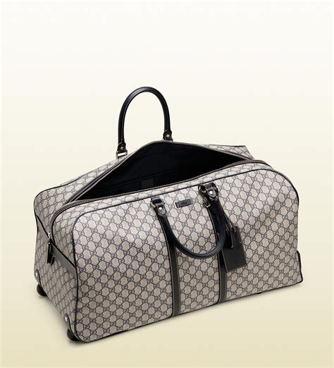 gucci black duffle|Gucci duffle bag with wheels.